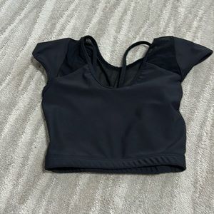 Five dancewear. Petite adult, but fits youth size 8. Excellent condition!